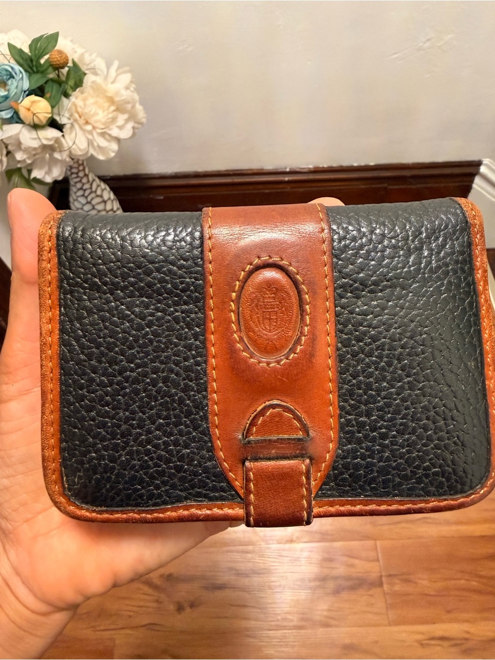 Pebble-Grain Bifold Wallet in Black with Brown Trim